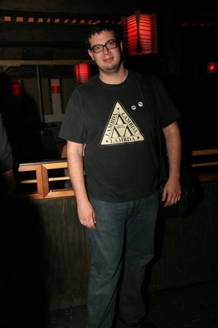 Black-Shirted Man at the Pub