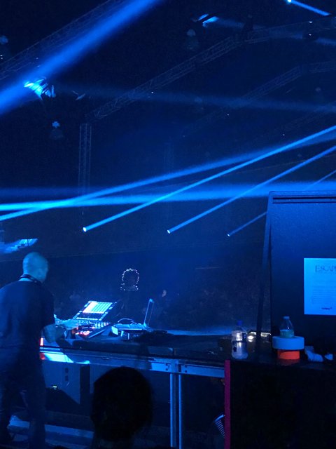 DJ Ignites the Night with Blue Lights