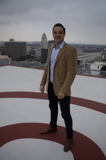 Man in Red and White Circle on Rooftop