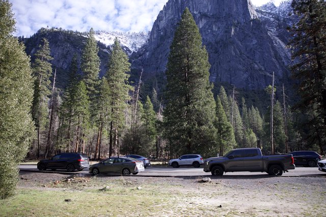 Yosemite Valley Parking Beneath Snow-Capped Granite Cliffs