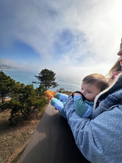 Mother and Child Admiring the Ocean View