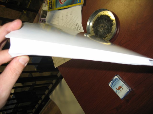 Holding a white paper