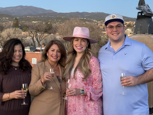 Four Happy Friends Enjoying Wine in the Santa Fe Countryside