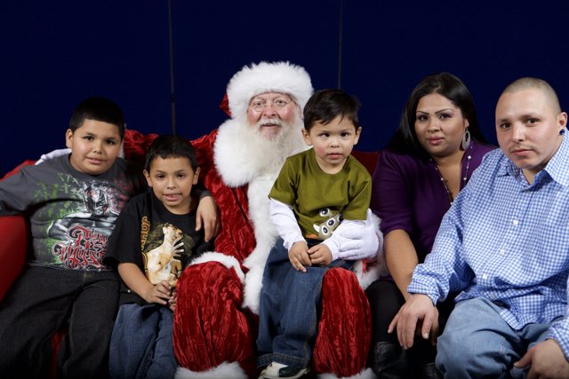 The ______ Family's Christmas Photo with Santa Claus