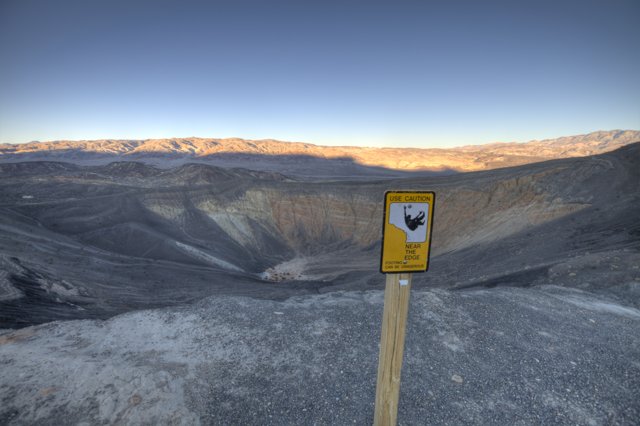 Warning Sign at Death Valley Crater