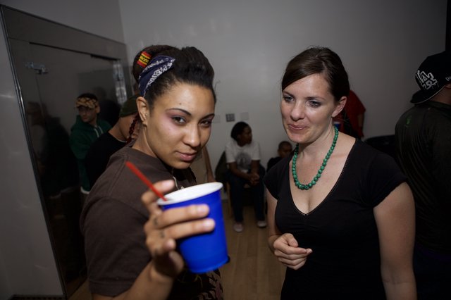 Two Women Sharing a Moment at a Dubstep Party