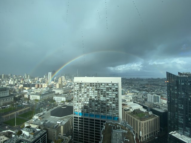 Rainbow over the Urban Skyline