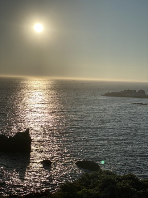 Radiant Sunset over the Coastal Rocks