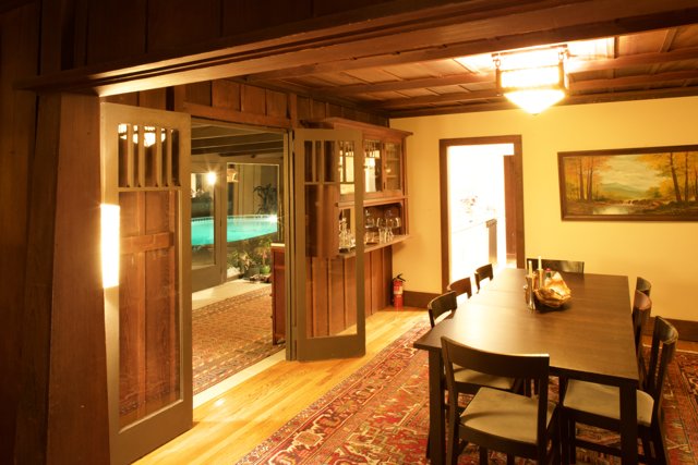 Rustic Dining Room with Hardwood Flooring