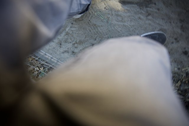 Sneaker Steps on the Loose Earth