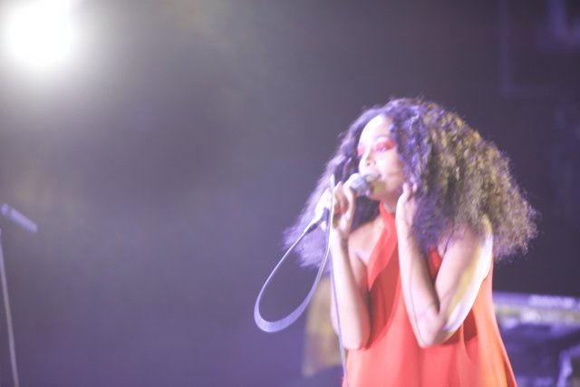Solange Rocks the Stage in a Fiery Red Dress