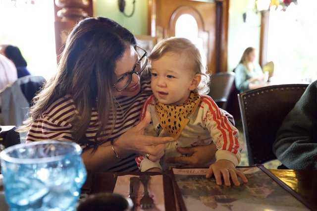 Mother and Child Sharing a Moment at Restaurant