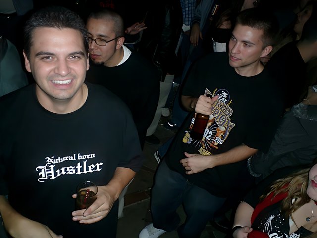 Black Shirted Man Enjoying a Beer at the Pub
