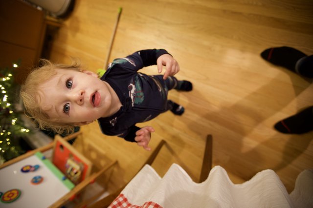 Young Child Playing with Toys on Christmas Morning