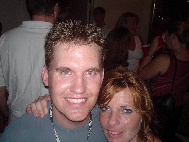 DEFCON 2004 Party Night with Two Smiling Attendees