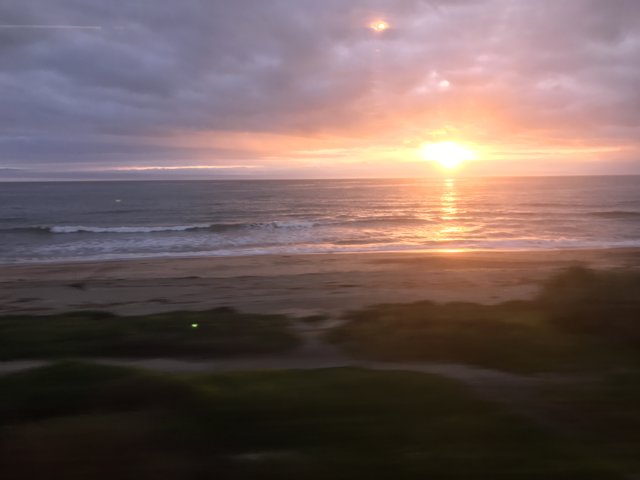 Radiant Sunset from a Moving Train