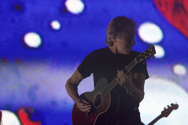 Roger Waters Strums on Stage