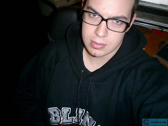 Dave B in Black Hoodie and Glasses