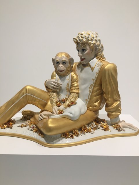 Golden Figurine of a Man and Monkey