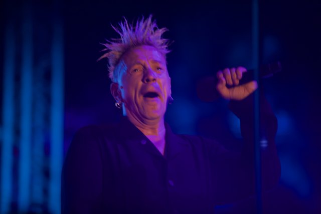 Mohawked Man with Microphone