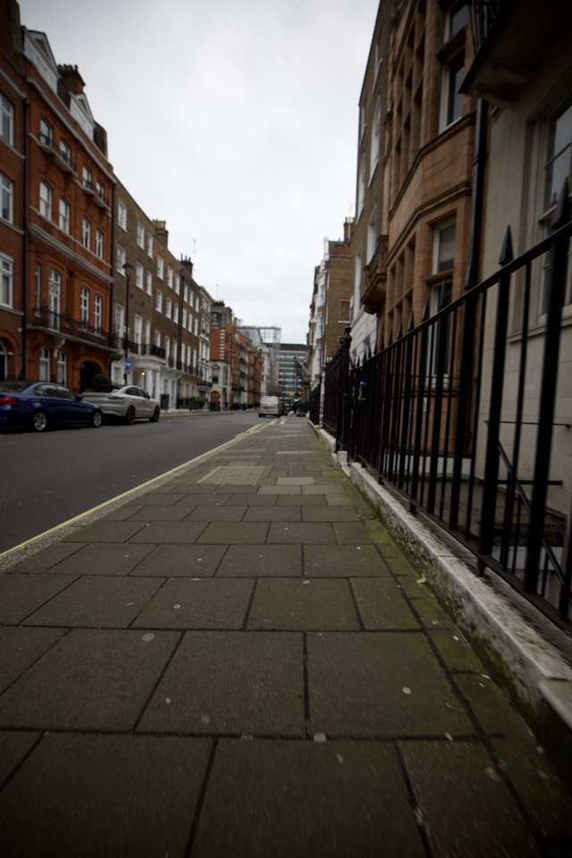 Wet Pavement on a Quiet London Street
