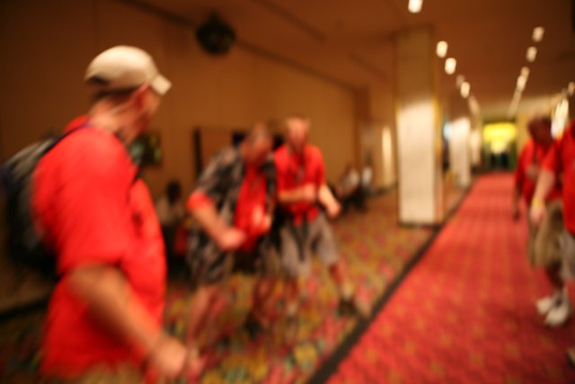Blurry Corridor Crowded with Six Stylish People