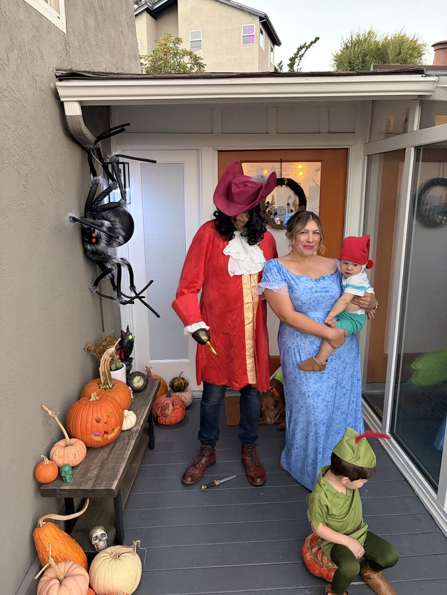 Peter Pan Family Halloween Costume on Decorated Porch