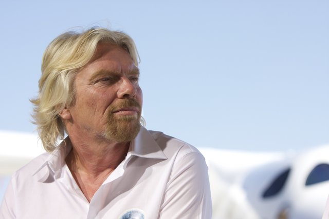 Richard Branson sits in front of the White Knight Two