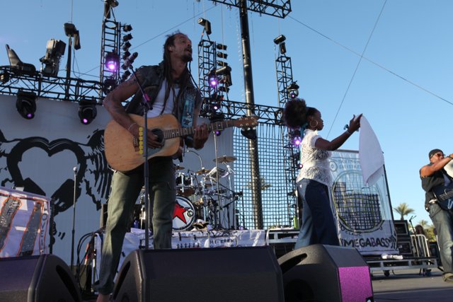 Michael Franti rocking out on stage