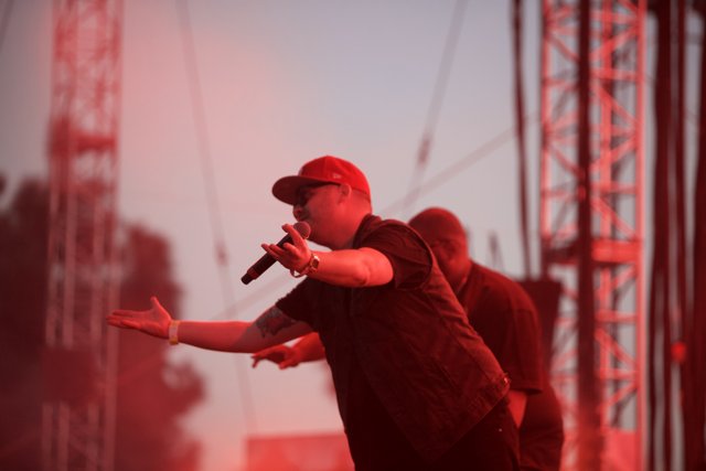 Red-Hatted Performer Rocks the Stage at FYF Concert