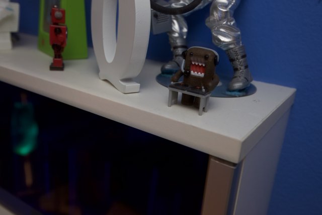 Robotic Figurine on a Shelf