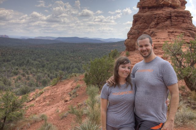 Couple Smiling Atop Sedona Red Rock Vista