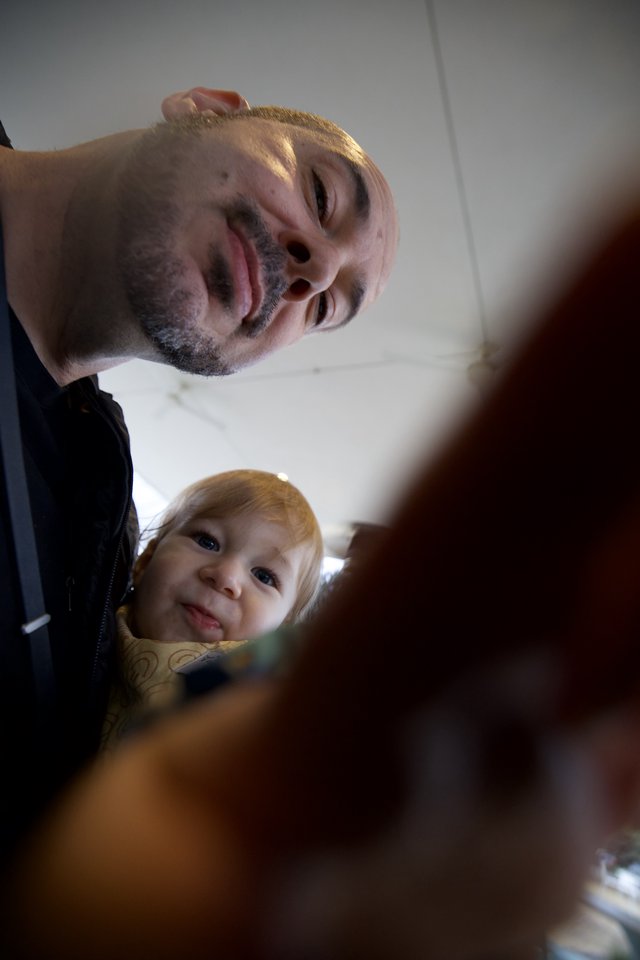 Father and Child Selfie Moment at Dinner