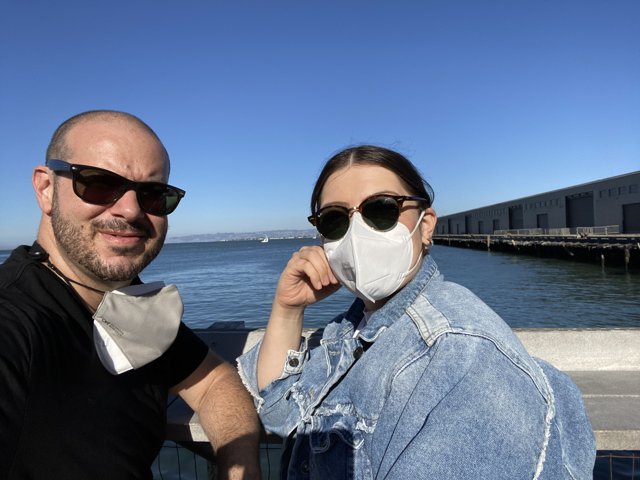 Masked Couple on San Francisco Pier
