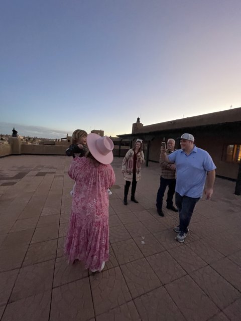 Pink Dress Lady Surveys Santa Fe's Urban Landscape from Rooftop