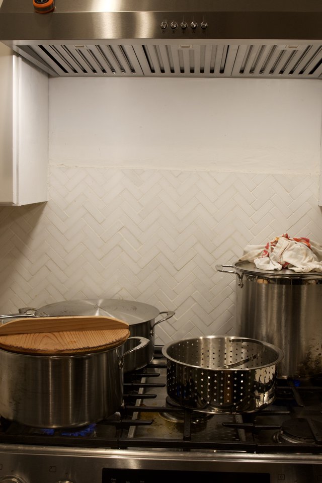 Active Kitchen Stove with Multiple Pots During Christmas Cooking