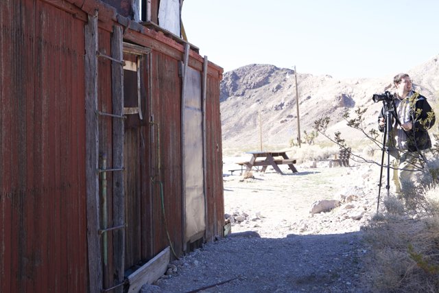 Man and Building amidst Death Valley's Winter Landscape