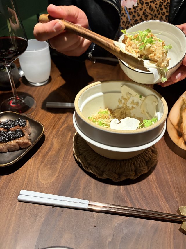 Sharing Salad at an Asian Restaurant Dinner