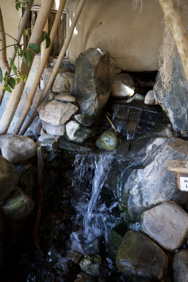 Rustic Indoor Water Feature with Natural Stone Elements