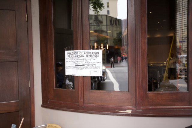 Restaurant Sign on Plywood Window