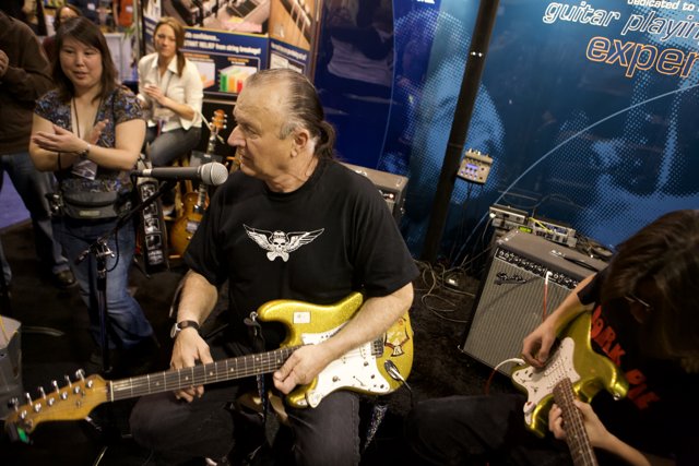 Dick Dale rocks the stage with his electric guitar at 2008 NAMM concert
