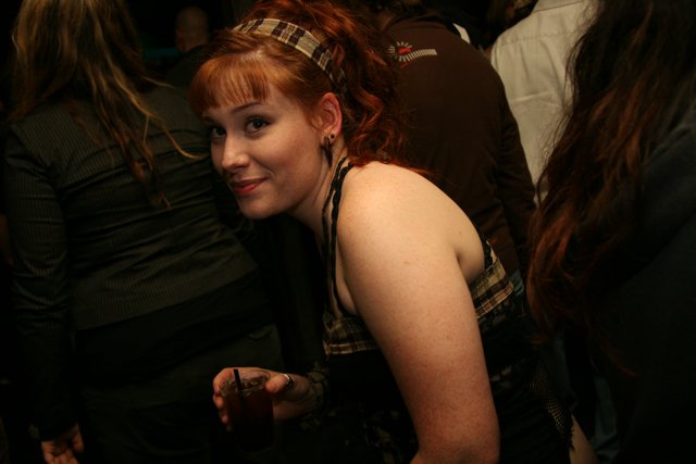 Red-Haired Beauty at the Club