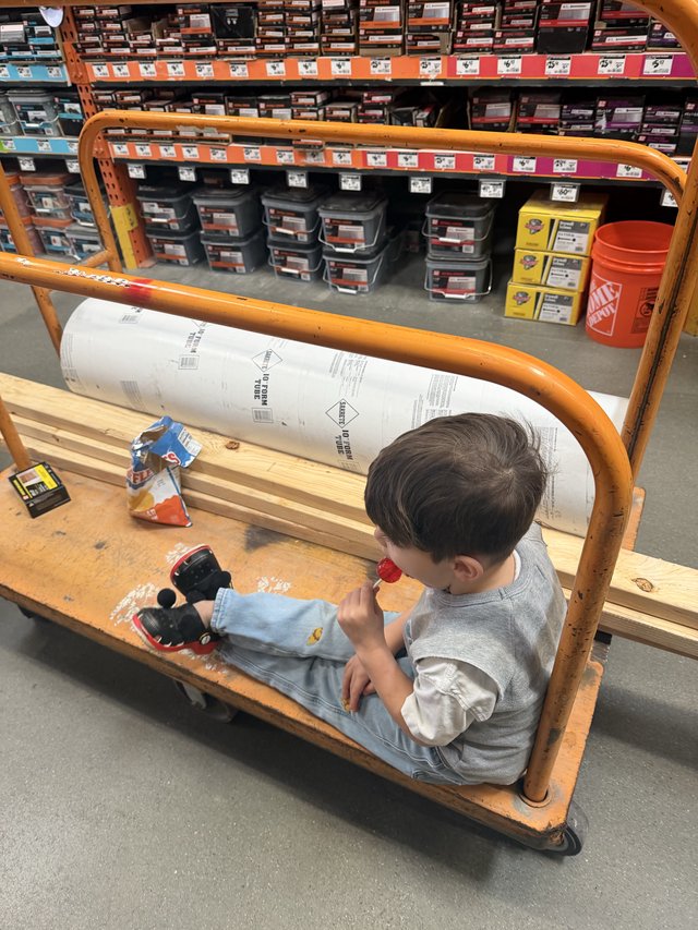 Young Child Enjoying Workshop Time at Home Depot