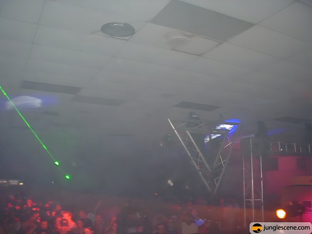 Green Laser Light Shines on Massive Nightclub Crowd