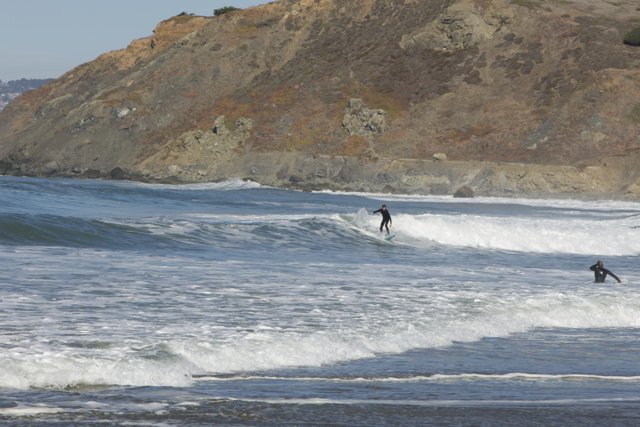 Duel of the Surfers Against Pacifica's Grandeur