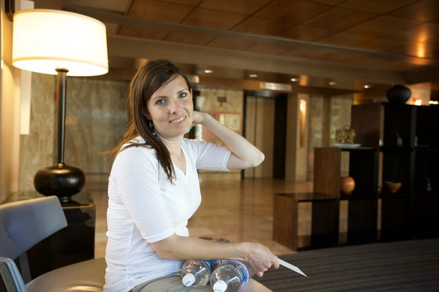 Woman Relaxing in San Francisco Hotel Lobby