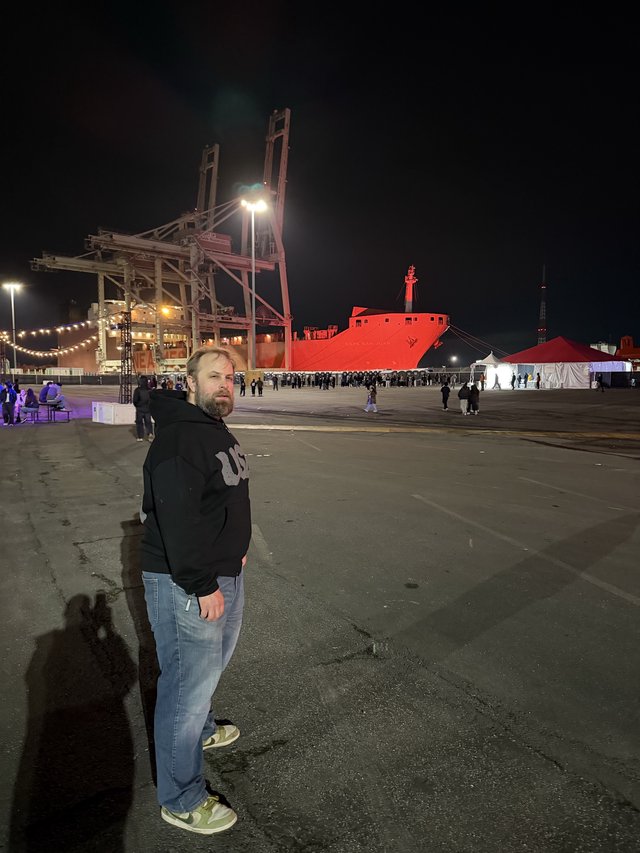 Night at the Industrial Port with Red Ship