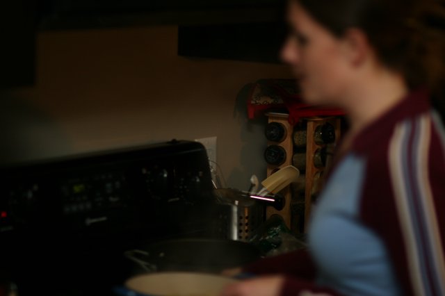 Late Night Cooking in a Dimly Lit Kitchen