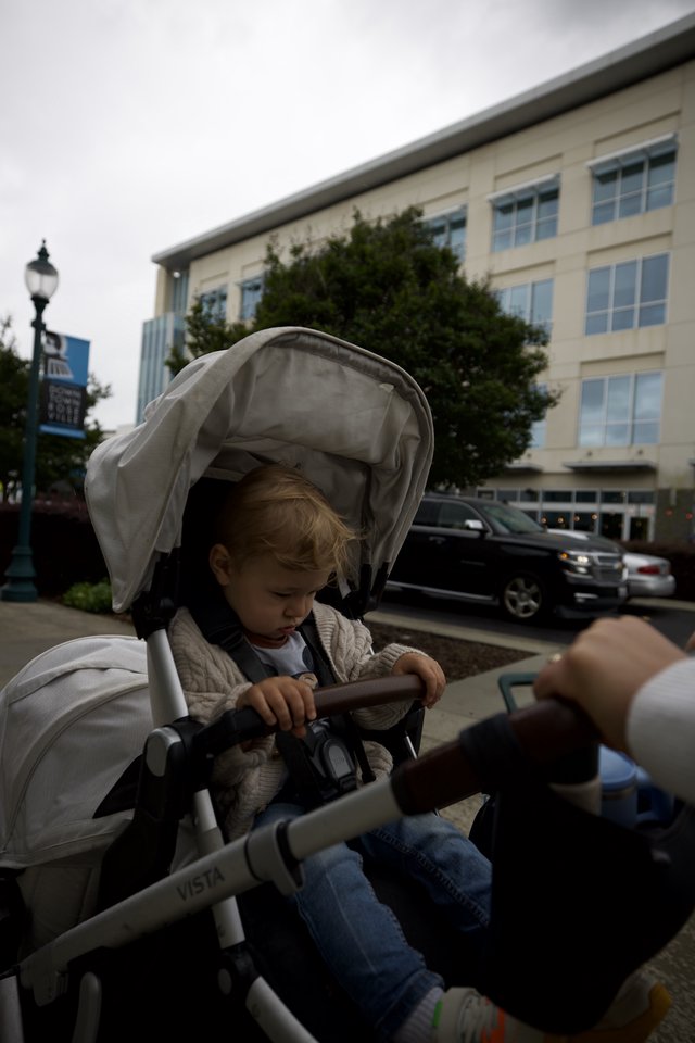 Toddler in Stroller on Urban Sacramento Street