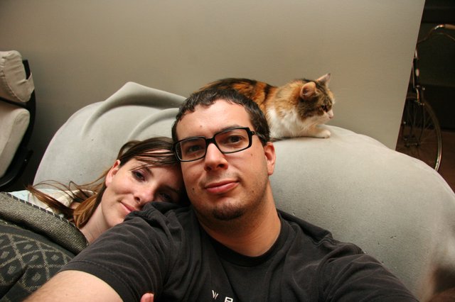 Cozy Couple Selfie with Calico Cat Companion